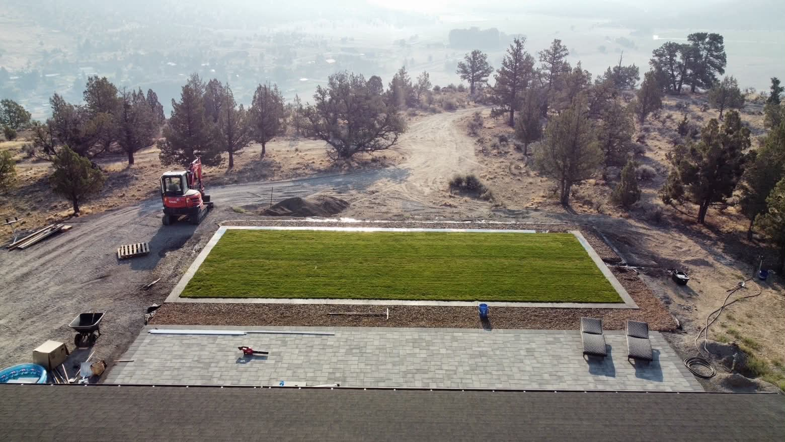 Completed border project with lawn and patio
